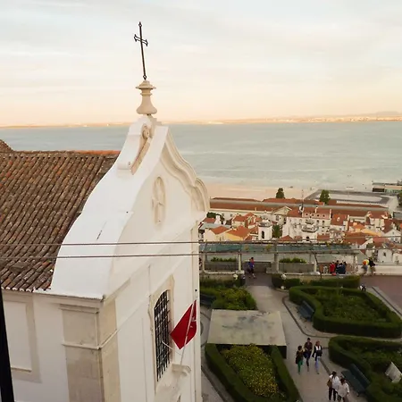 Tram 28 With Perfect View Over Alfama Lisbon